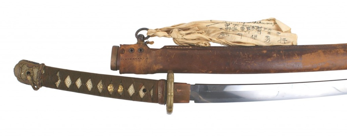 Japanese Yasukuni shrine sword with tang signed “Yasunori” and dated “A Lucky Day in March 1941” (5,625).