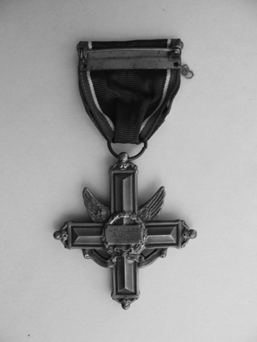 The reverse of WIrt’s Distinguished Service Cross is engraved with his name. The citation for the award reads, “The President of the United States takes pleasure in presenting the Distinguished Service Cross to Charles A. Wirt, Captain (Infantry), U.S. Army, for extraordinary heroism in connection with military operations against an armed enemy while serving with Company G, 2d Battalion, 16th Infantry Regiment, 1st Infantry Division, in action against enemy forces on 24 March 1945. Captain Wirt’s outstanding leadership, personal bravery and zealous devotion to duty exemplify the highest traditions of the military forces of the United States and reflect great credit upon himself, the 1st Infantry Division, and the United States Army. – Headquarters, Third U.S. Army, General Orders No. 137 (1945)”