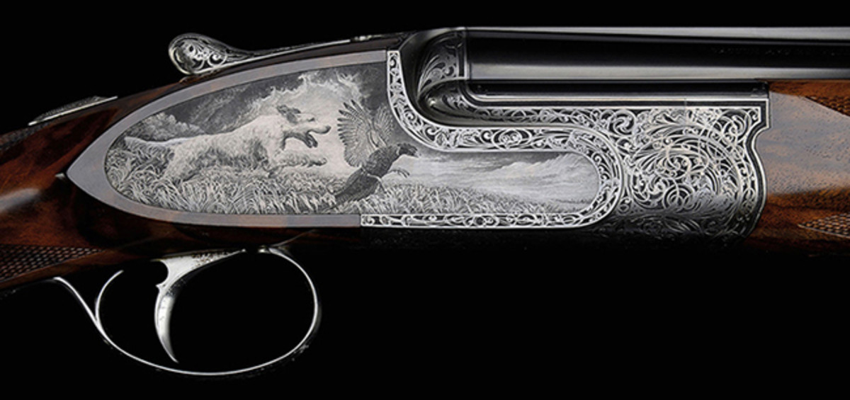 A stunning true pair of Ivo Fabbri 20 ga. O/U with incredible detailed engraving by renowned Italian master engraver Firmo Fracassi.