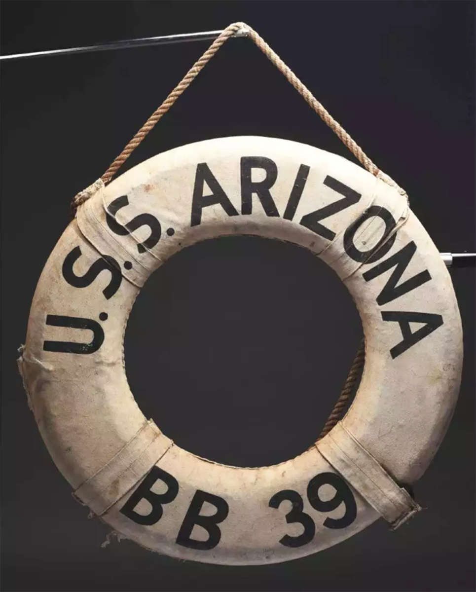  USS Arizona life ring recovered from the ship after Pearl Harbor attack, Dec. 7, 1941. One of very few of its type known to exist. Est. $40,000-$60,000