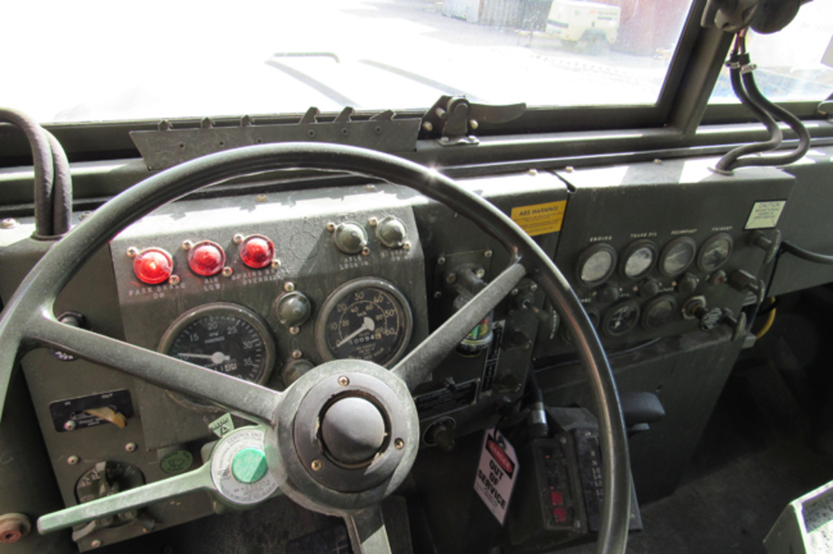 Looking at the dashboard from the driver’s seat reveals the different location of indicators, tachometer, and odometer, from what is normally found in an M939A2.