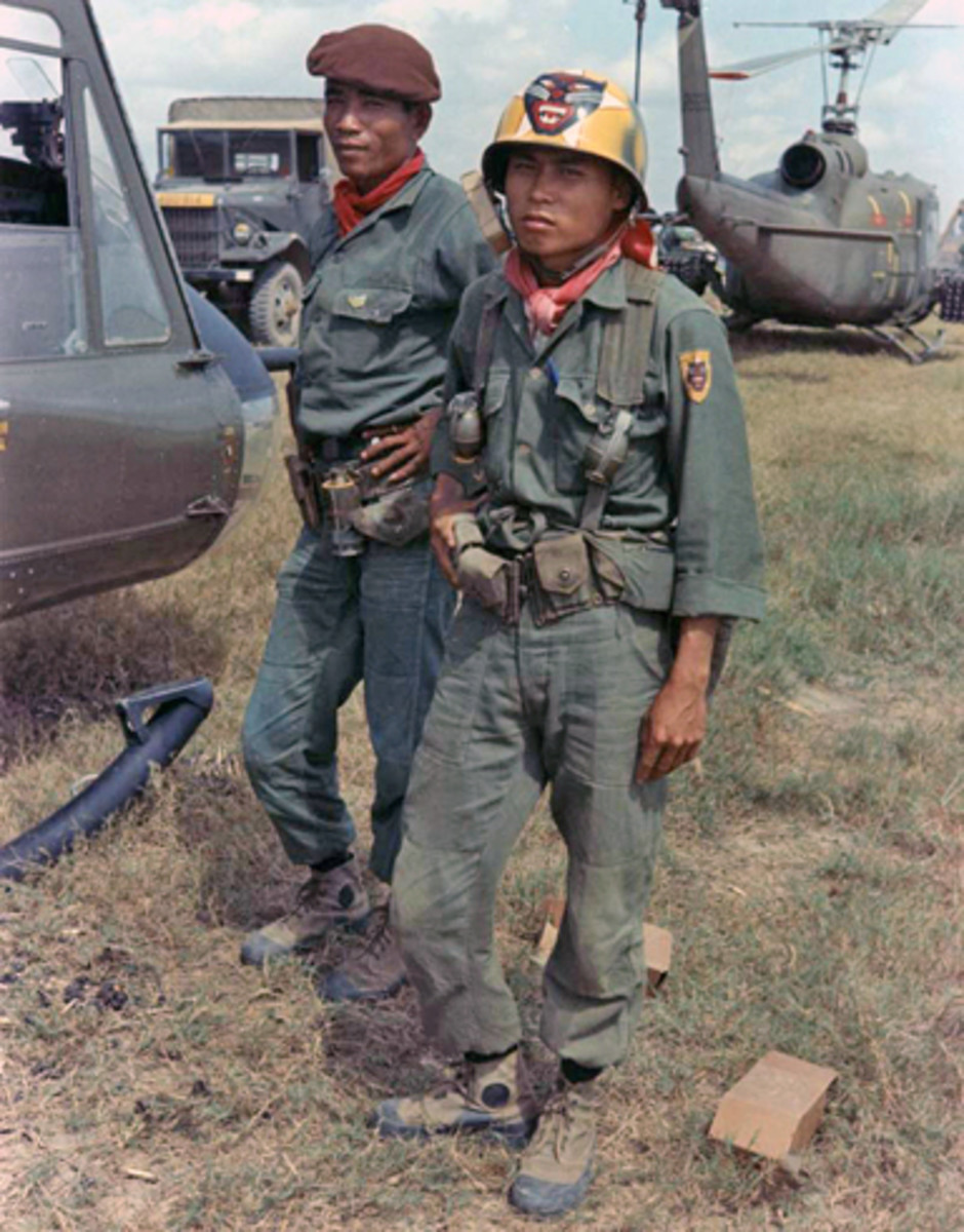 This most popular—and most faked—painted helmet of the Vietnam War is probably the ARVN Ranger helmet. Whereas an original helmet would be a collection centerpiece, original photos of soldiers wearing the helmets provide the collector with a relatively safe alternative to the risk involved in acquiring an actual painted helmet.