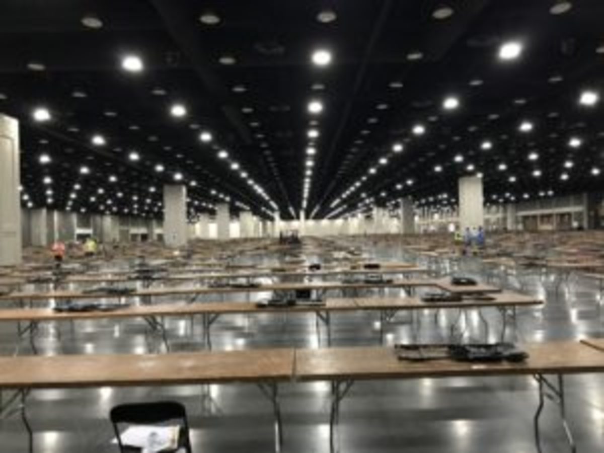  Though about 60 people are present, it takes the 20 who are really working about four hours to place the 1,965 tables and chairs for the show.