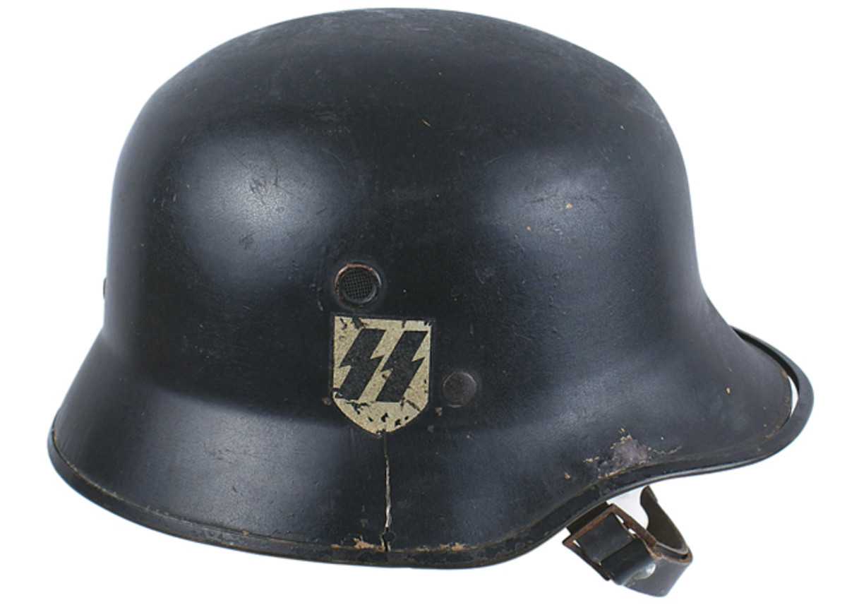 Unusual M1940 World War Ii German SS single decal fiber helmet, in untouched field-found condition (MB: $1,000).