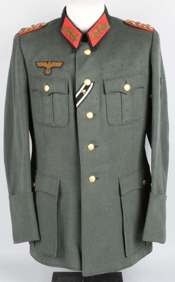  Nazi German Army tunic worn by Lieutenant General Theodor Busse, who served from 1940-1942 as chief of Operations to Gen. (later Field Marshal) Eric von Manstein. Sold above estimate for $8,400