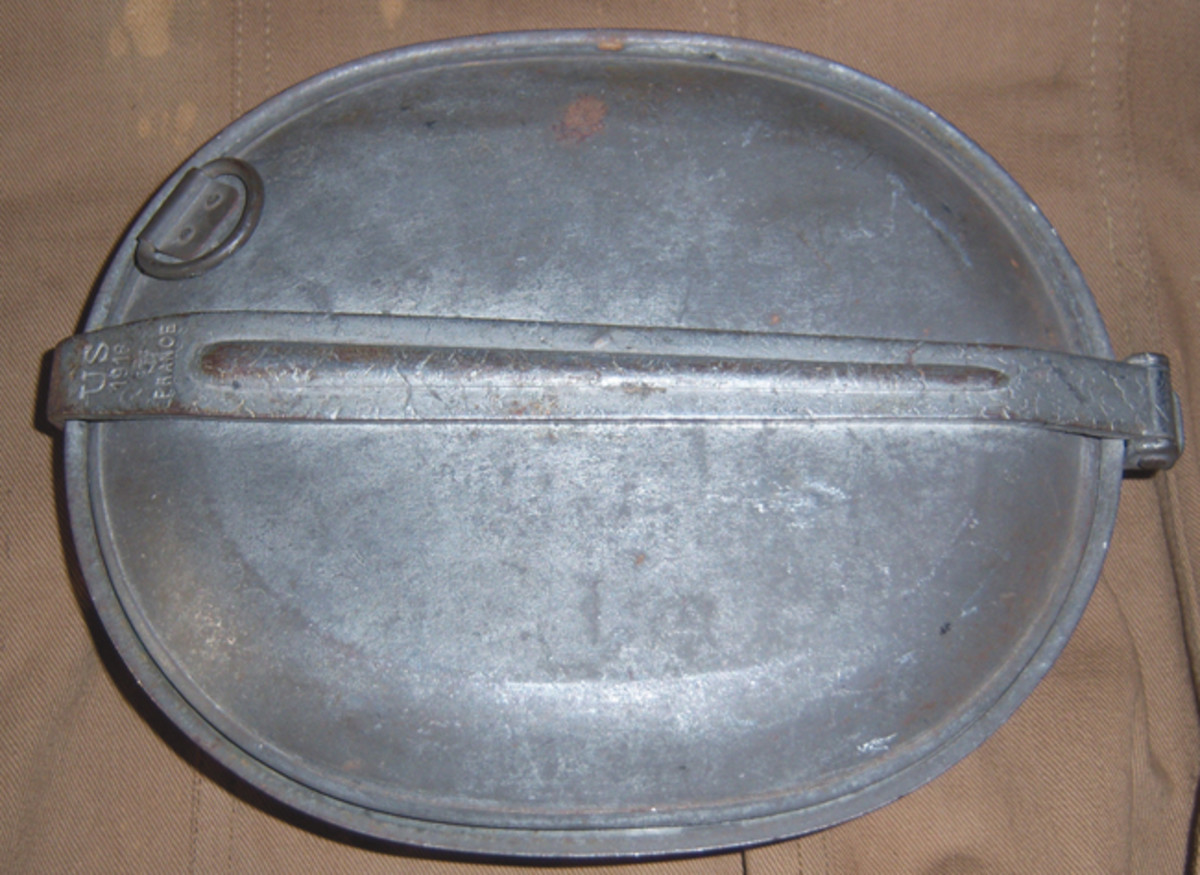  Sometimes the mess kit itself is worthy of attention and study. This mess kit is one of the relatively few that were made in France during the war. In an attempt to reduce the amount of cargo being shipped across the Atlantic, the Services of Supply contracted for many such items to be produced locally.