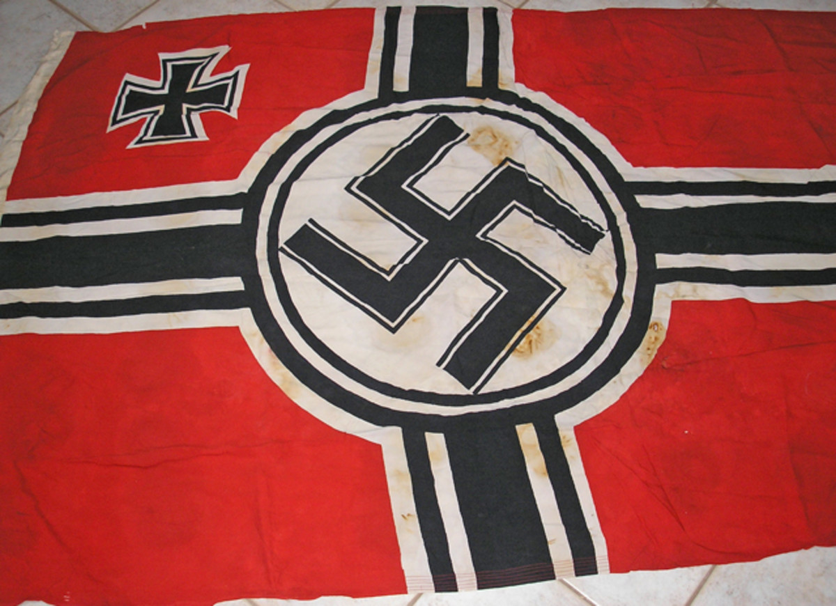 This veteran-acquired Reichs War Flag differs from the two illustrated below in that the bars of the center cross touch the outer ring and there is no space between the circle and the center cross. Is this just an anomaly or would it constitute a third pattern of the Reichs War Flag?