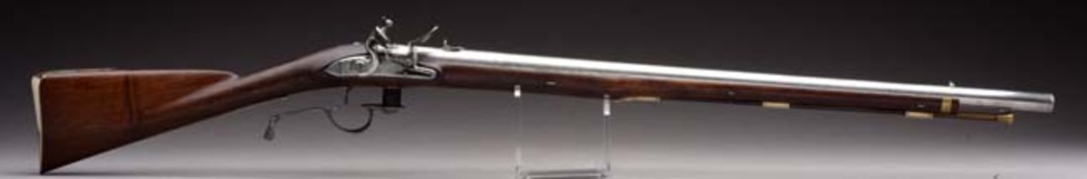  Rare, documented Ferguson breech-loading, flintlock-pattern Rifle No. 2 by Durs Egg, book example. Sold for $96,000