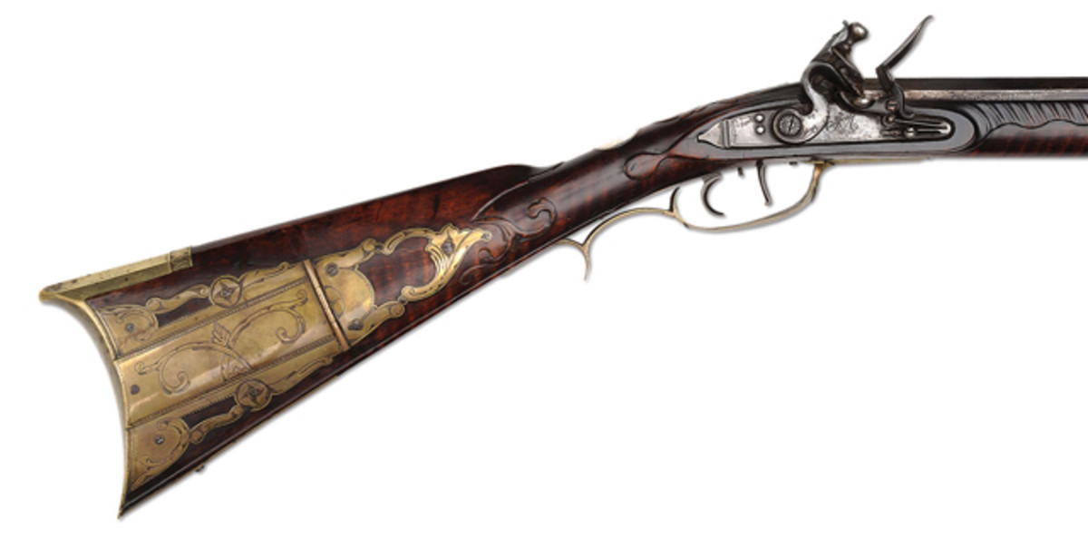 Extraordinary signed John Armstrong F/L Kentucky Rifle with fine relief carved curly maple stock and silver inlays as pictured in “The Kentucky Rifle” by Dillin, Ex Martin Coll (Frank Sujansky Coll)