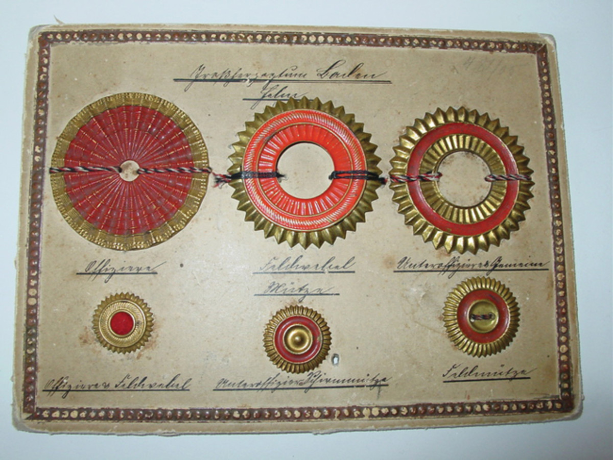 A pre-World War I “sample card” showing various cockades for helmets and other headdress from the German state of the Grand Duchy of Baden.