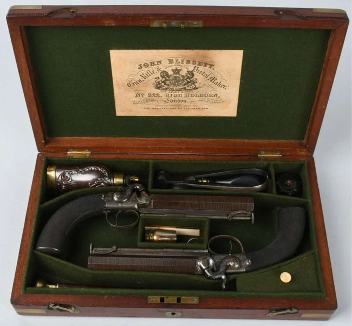  1850s English cased John Blissett percussion pistols with accessories, approximately .65 caliber, finely engraved, original case with key for lock.
