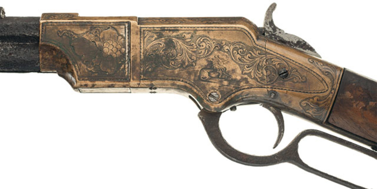 Lot #1000: New Haven Arms Henry Lever Action Rifle with Samuel Hoggson Attributed Factory Engraved Brass Frame. Estimated Price: $15,000-$25,000.