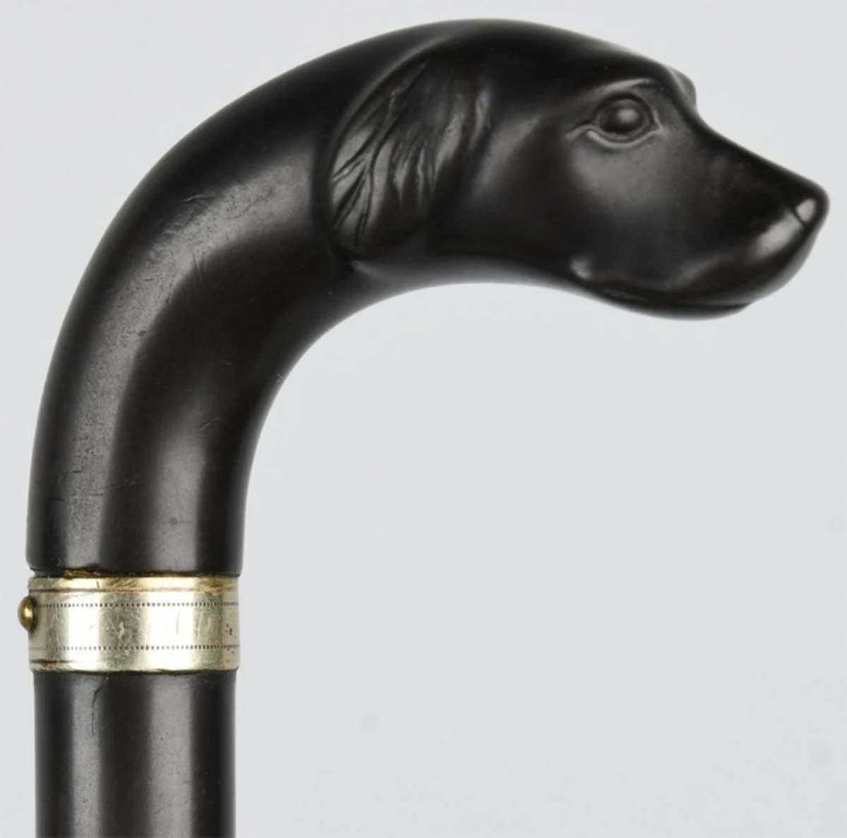  Remington .22 caliber cane gun with small dog’s head handle, 1866-1888, gutta percha veneer with German silver collar.