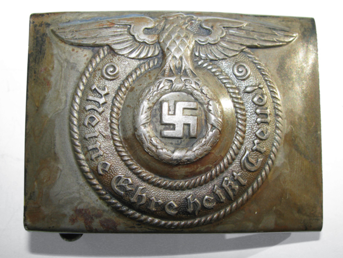  The enlisted men wore a rectangular buckle with eagle, swastika and SS motto.