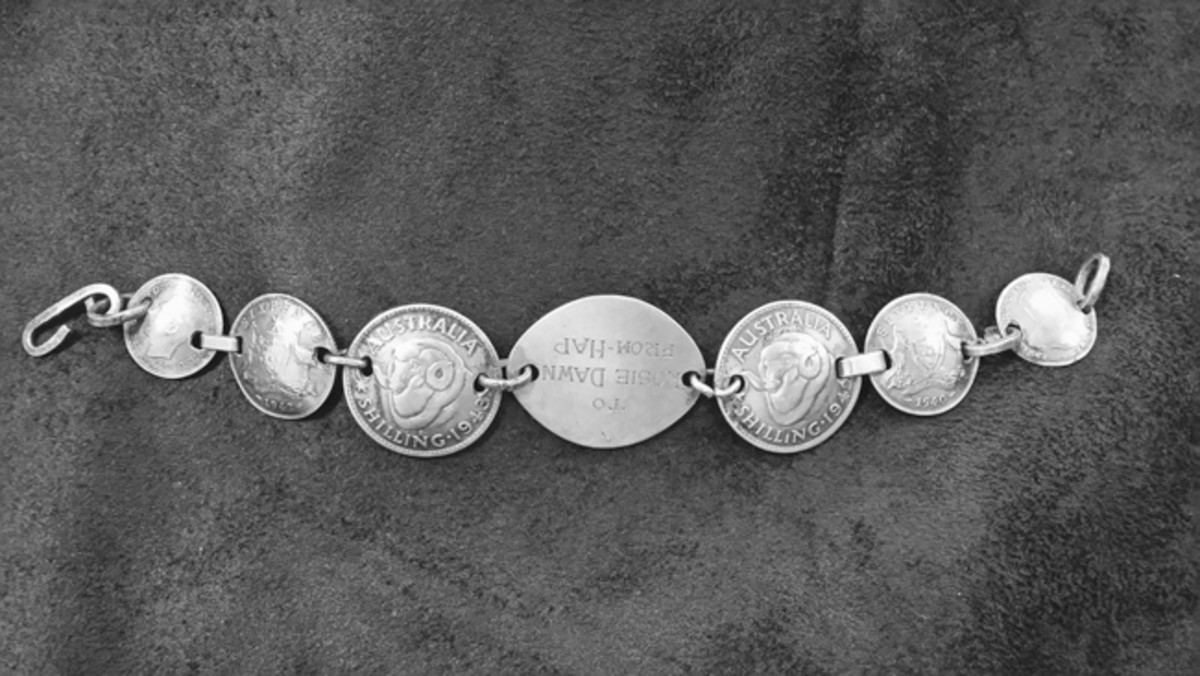  Created during World War II in 1944 on New Guinea, Hap Goldlust demonstrated a fine sense of craftsmanship in every detail of this coin bracelet for his wife, Rosie Dawn. US Navy Seabee Museum, Port Hueneme, CA, Naval History and Heritage Command