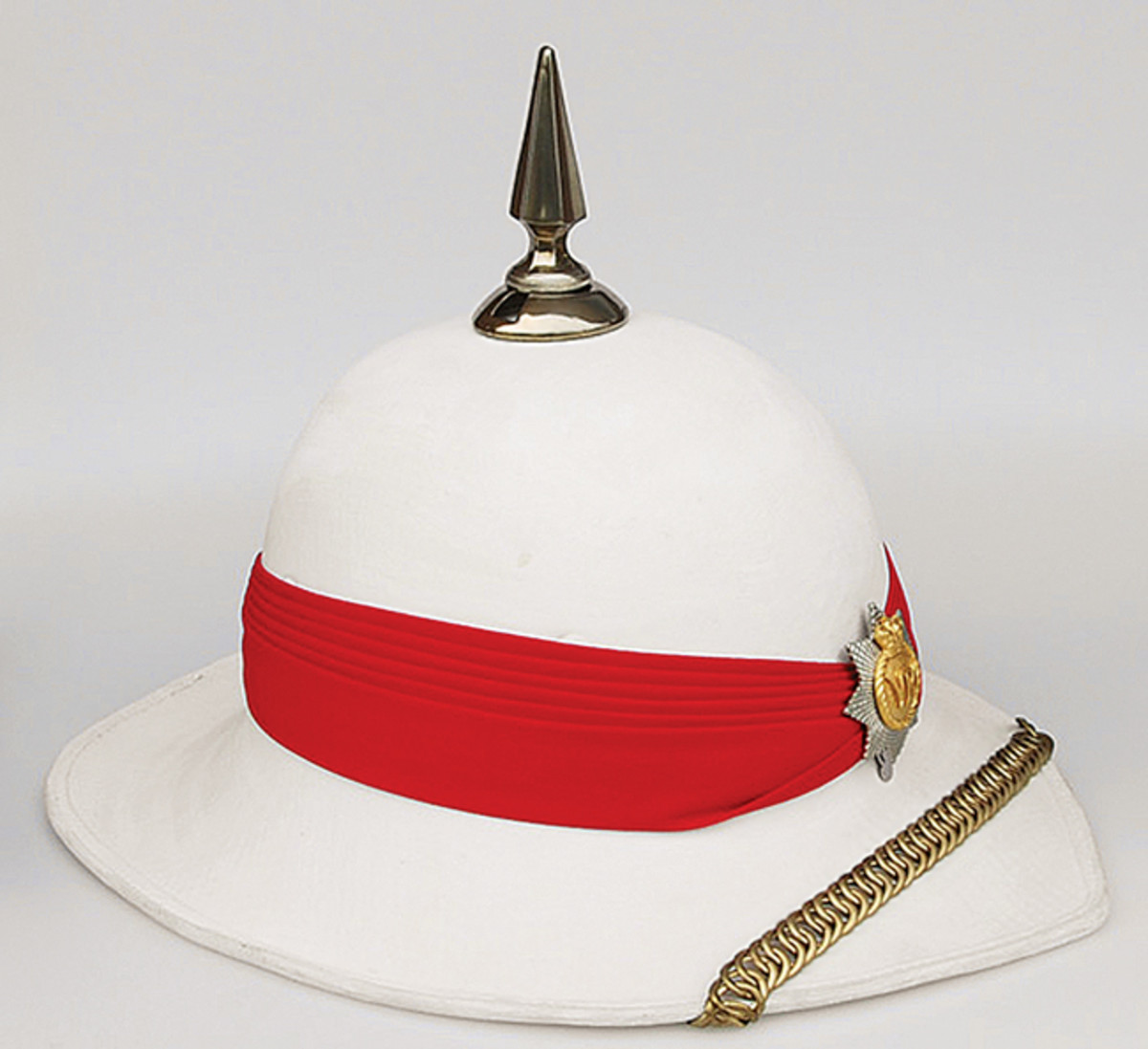  This modern “Wolseley” Pattern helmet is still used by the Royal Canadian Regiment on the parade ground. Externally it looks little different from the cork helmets that were introduced more than 100 years ago, but in fact it is made of fiberglass!