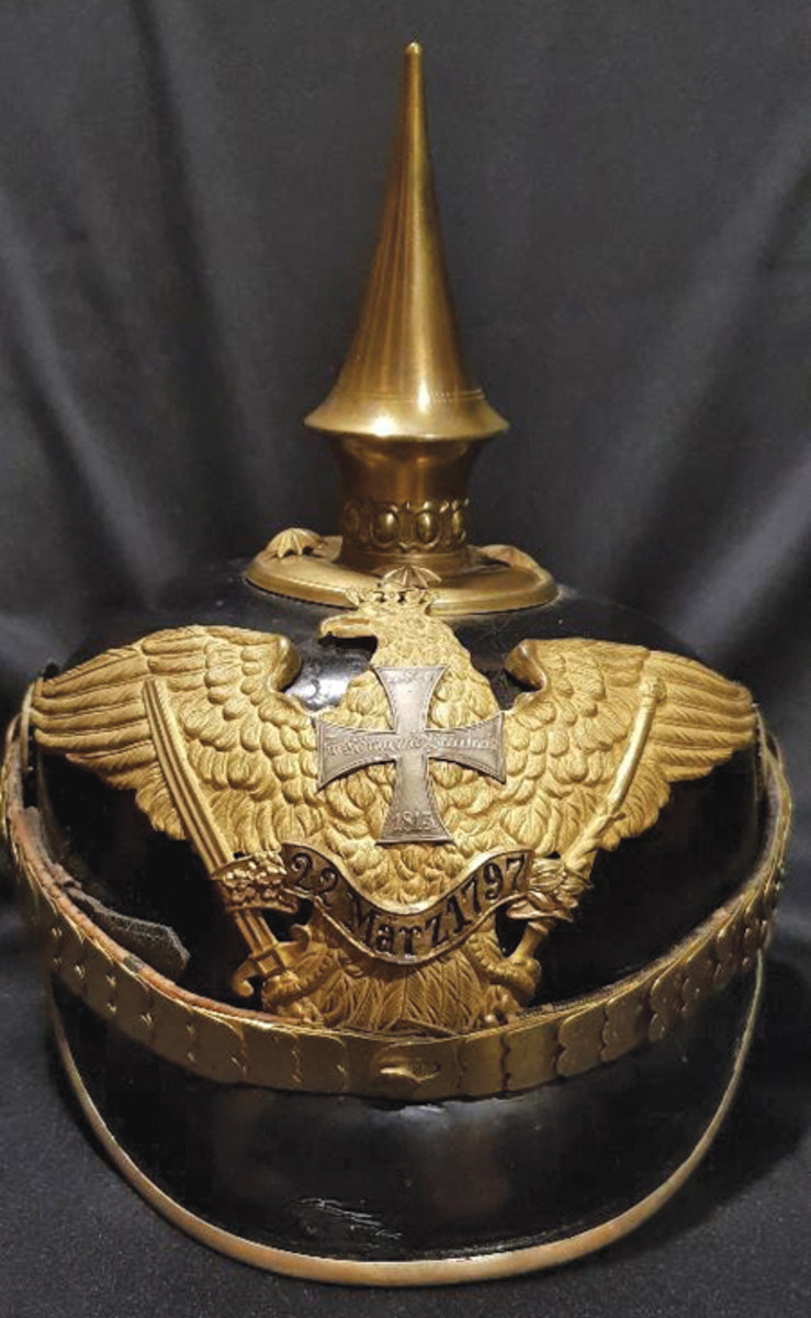  Amy’s prize Pickelhaube is this Grenadier Regiment No. 7 Reserve Officer helmet. The side rosettes securing the brass chin scales are of a special pattern which bear the regimental monogram of the crowned cipher of King Wilhelm I.