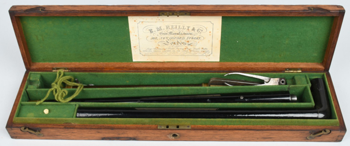 Circa-1850s E.M. Reilly (London) .32-caliber air-powered cane gun in original oak partitioned case with dealer’s trade label inside lid. Shoots lead balls. Sold above estimate for $3,120