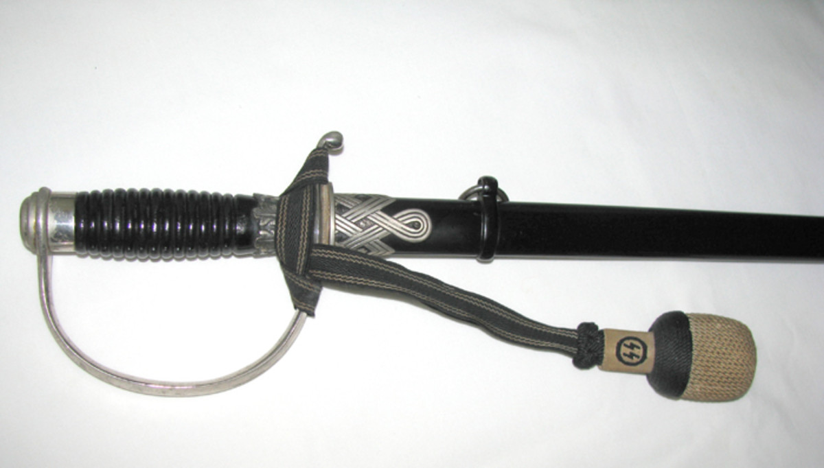 An SS NCO sword with the rarely encountered NCO portepee.