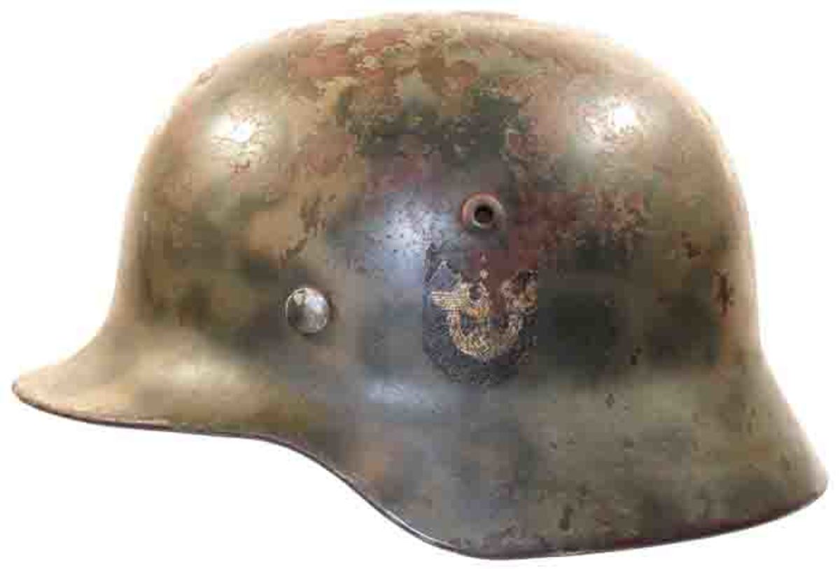 Purchased for $400, Matt was able to sell this WWII M-35 double decal field police helmet with a rare dot-pattern camo finish for $3,100 through grenadierauctions.com.