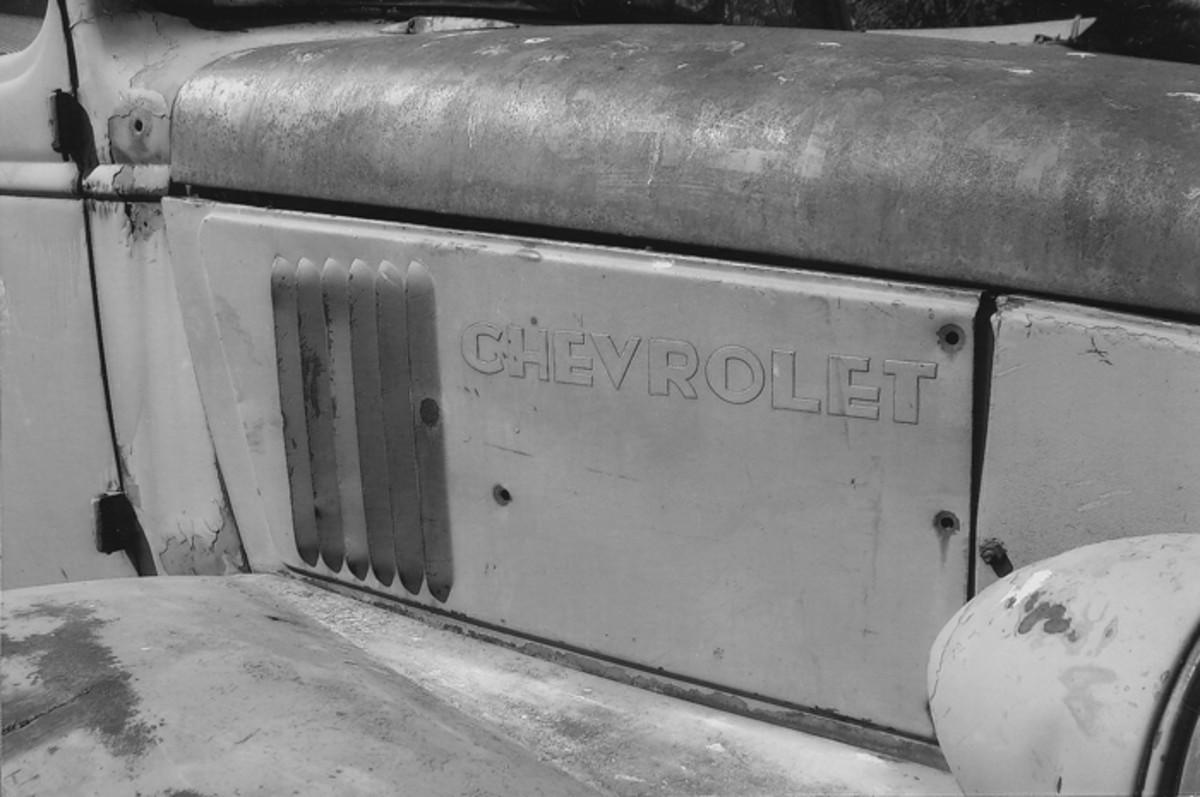 Engine side panels — especially those embossed “Chevrolet”-— are hard to come by since many civilian owners threw them away to more easily service the engine.