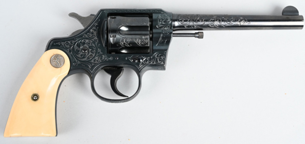 Colt Official Police Revolver, .38 Special, made in 1930, factory-engraved by Colt master engraver William H. Gough (active 1912-1940). Sold for its high-estimate price of $15,000