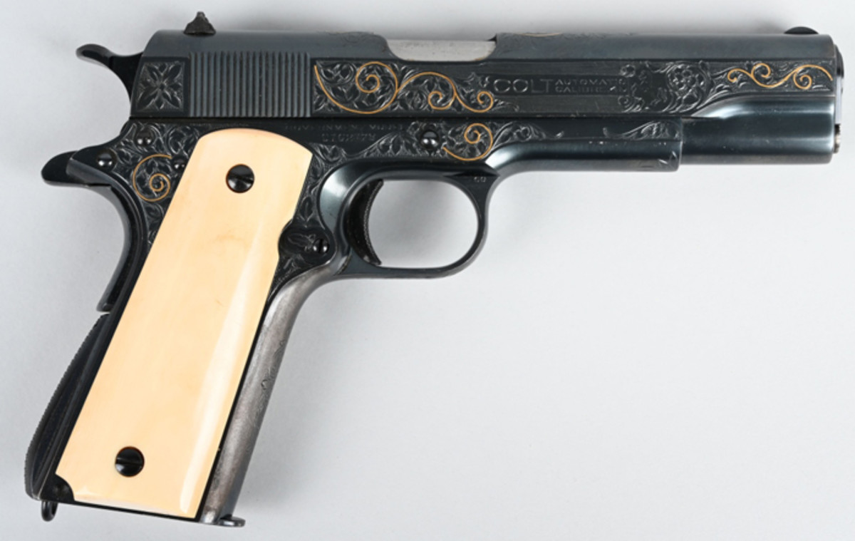 Gold-inlaid Colt 1911 .45 ACP-caliber gun, factory-engraved by Colt master engraver William H. Gough (active 1912-1940). Shipped in 1931 to Scruggs, Vendervoort & Barney, St. Louis. Sold for $51,600 against an estimate of $25,000-$35,000