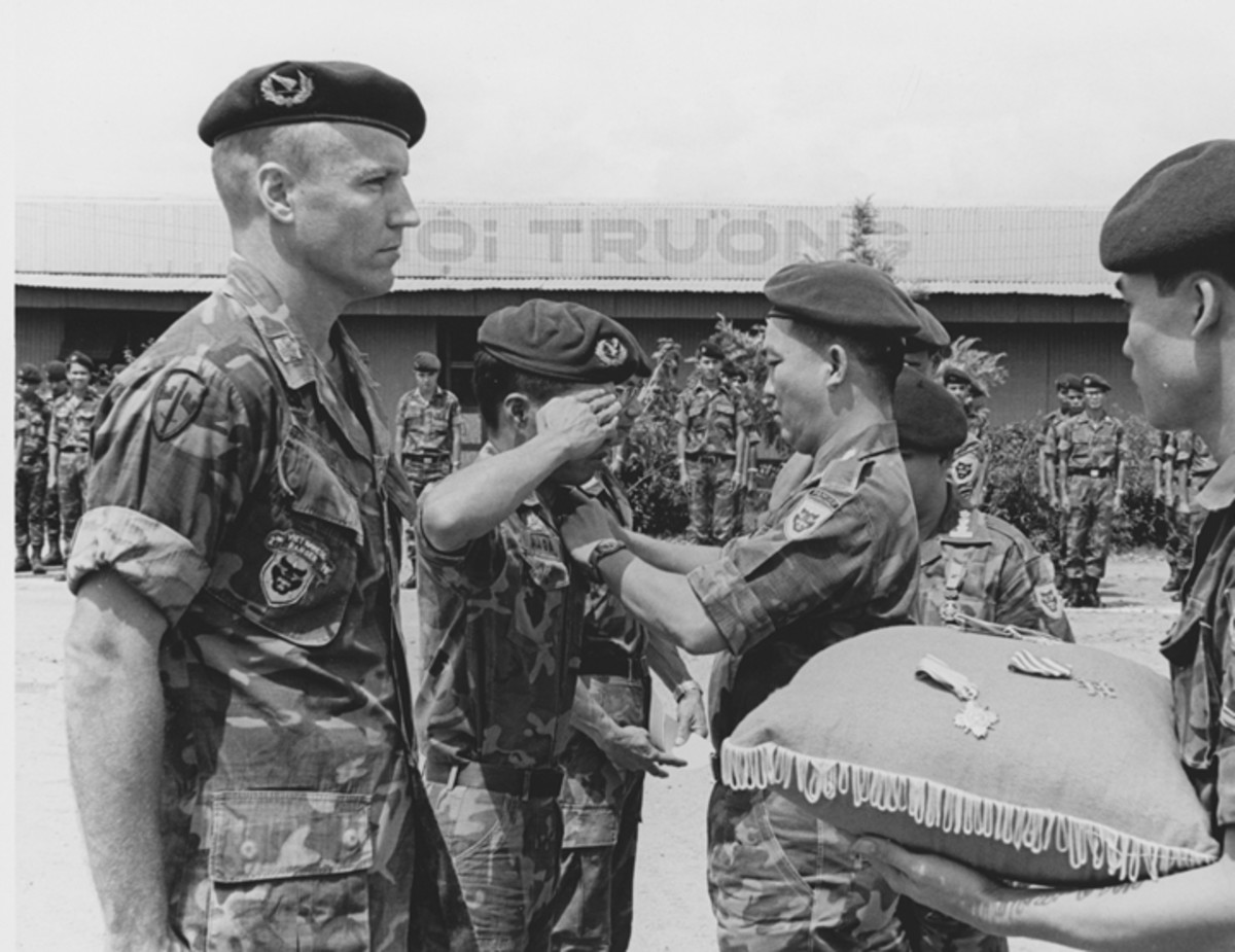 LTC (Ret.) Thomas M. Johnson shared this 1968 photo of himself awaiting receipt of Vietnamese valor decorations from the ARVN commanding officer of the 2nd Vietnamese Ranger Battalion in Pleiku, South Vietnam. During his second tour of duty, Johnson was a senior advisor assigned to the Vietnamese Ranger Command responsible for the border camps in the mountainous highlands of II Corps.