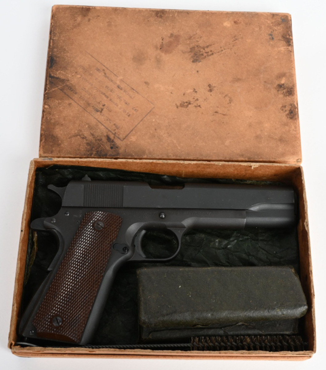 Pristine Ithaca 1911-A1 .45-acp pistol manufactured in 1943. Absolutely new condition and possibly unfired. Original box.