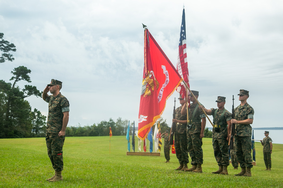 U.S. Marine Corps Maj. Patrick J. Foehl, the ceremony commander of troops, 2nd Landing Support Battalion, takes part in the invocation during a re-activation ceremony at Camp Lejeune, North Carolina, Oct. 16, 2020. The battalion was re-activated again to support aerial delivery and beach landing operations in support of tactical logistics missions for 2nd Marine Logistics Group (MLG) and II Marine Expeditionary Force. In line with the commandant's planning guidance, MLGs across the Marine Corps re-activated their landing support battalions after a 40-year hiatus.(U.S. Marine Corps