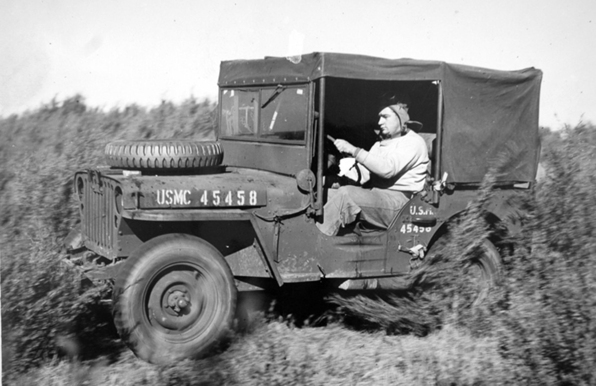 This is the Holden Jeep in its original form. Faintly visible through the glass is a Stokes basket. Special canvas cab covers were created for the Holden Jeeps, which contributed to their boxy looks.