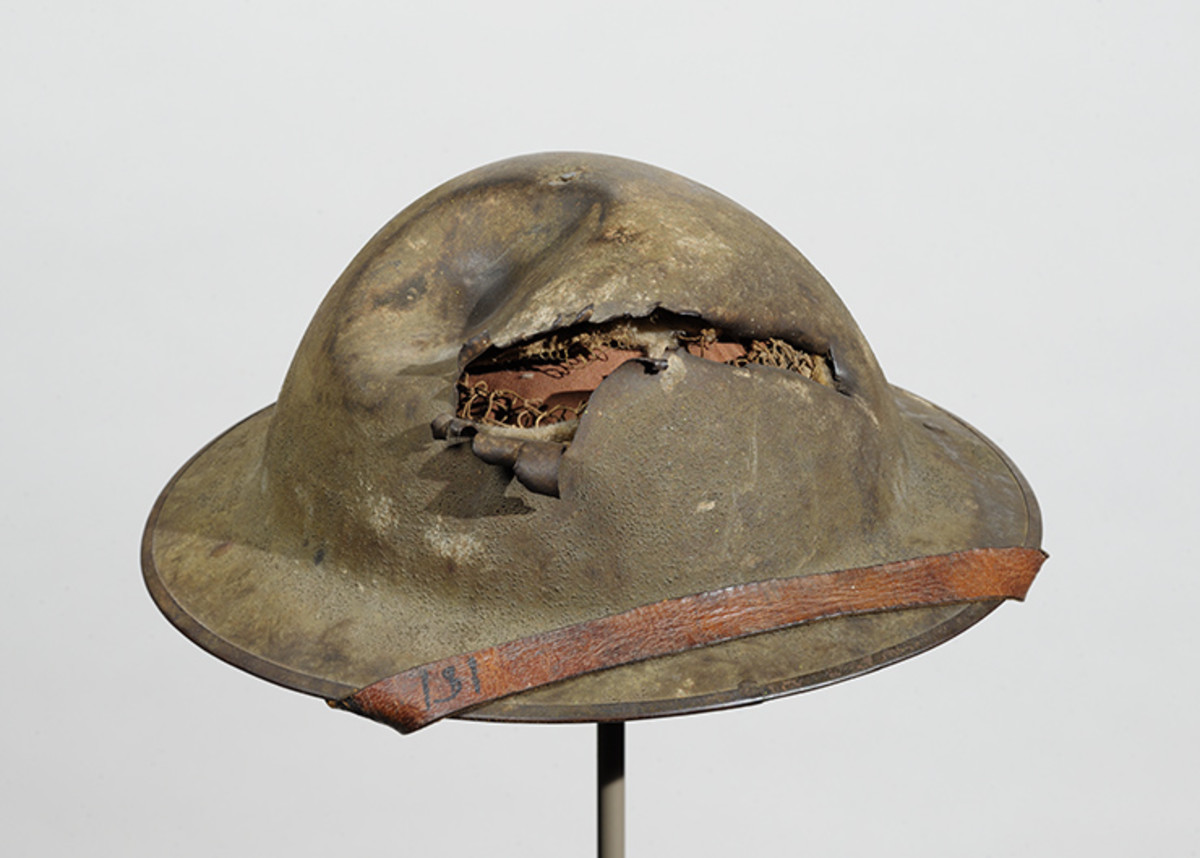 If artifacts could talk, this WWI helmet would tell us that North Carolina native Robert H. Salsbury was wearing it on November 9, 1918, when a machine gun round tore through the thin steel.