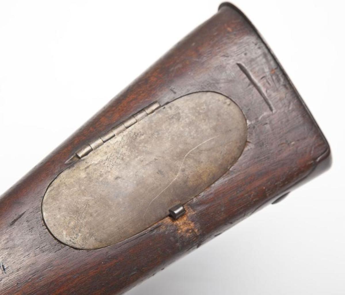 Hinged patchbox cover of a Model 1817 rifle.