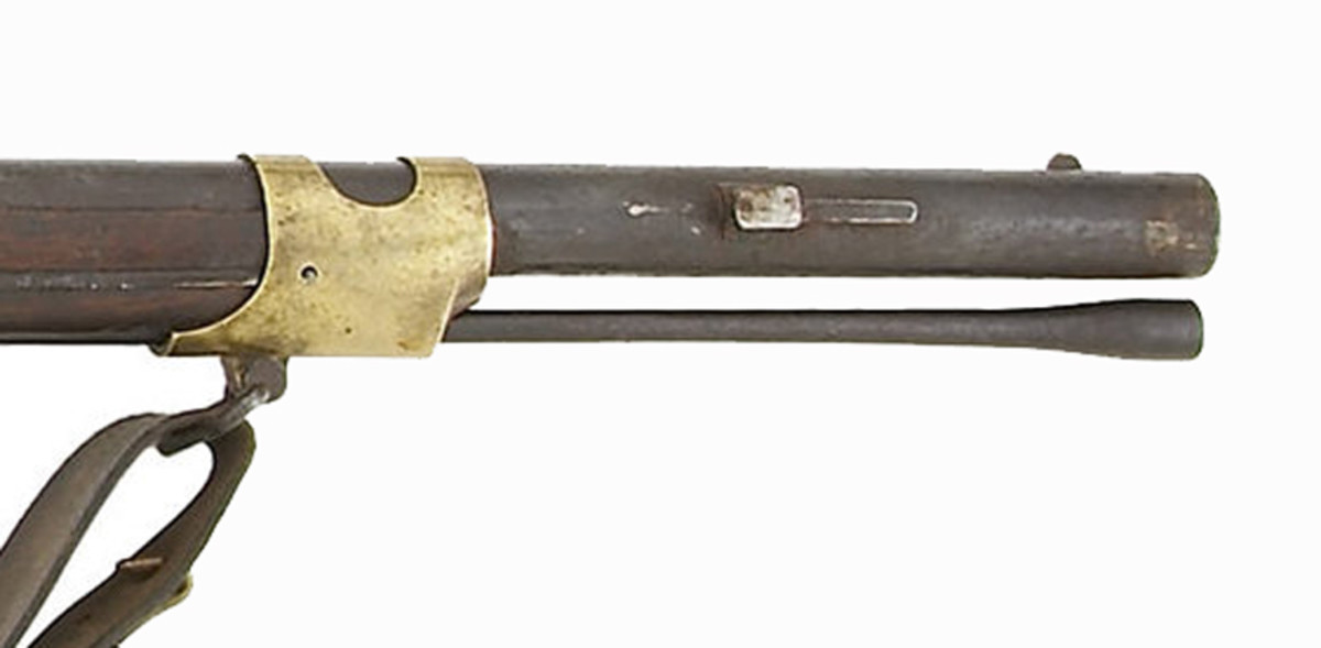 Whitney replaced the brass-tipped ramrods with a steel-tipped version cupped for use with Minié bullets. Furthermore, each of the 600 was fitted a with a bayonet stud that incorporated a 1” guide brazed to the right side of the barrel. Like the Harpers Ferry altered rifles, Whitney’s featured shortened front double-strap barrel bands.
