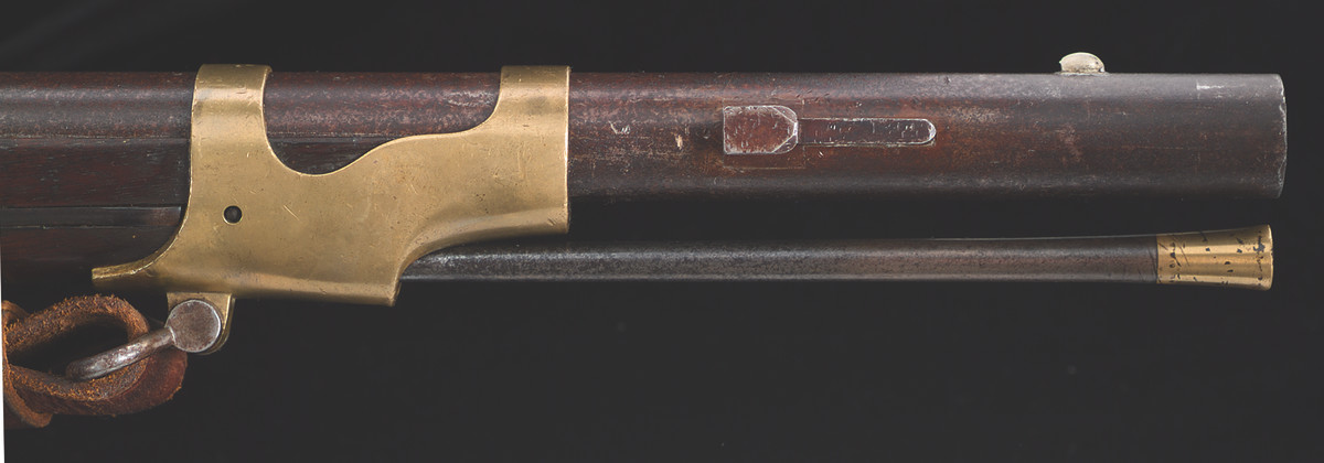 The bayonet lug accepts a New Hampshire Collins style saber bayonet and differs from the New Hampshire alteration in that it is attached without screws and has clipped corners at the front.