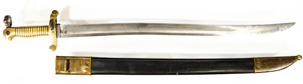 The bayonet was manufactured with a folding muzzle ring that passed over the front sight and eliminated the need for a lug to be attached to the rifle. Only about 1,650 of these bayonets were produced. The US arsenal alteration saber bayonets were issued with 1855 pattern scabbards