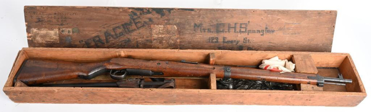 Captured Japanese Type 99 Ariska rifle with bayonet manufactured during World War II, with shipping crate and ephemera, including small Japanese flag. Provenance: Gary Thomas collection. Sold for $4,200, more than four times the high estimate