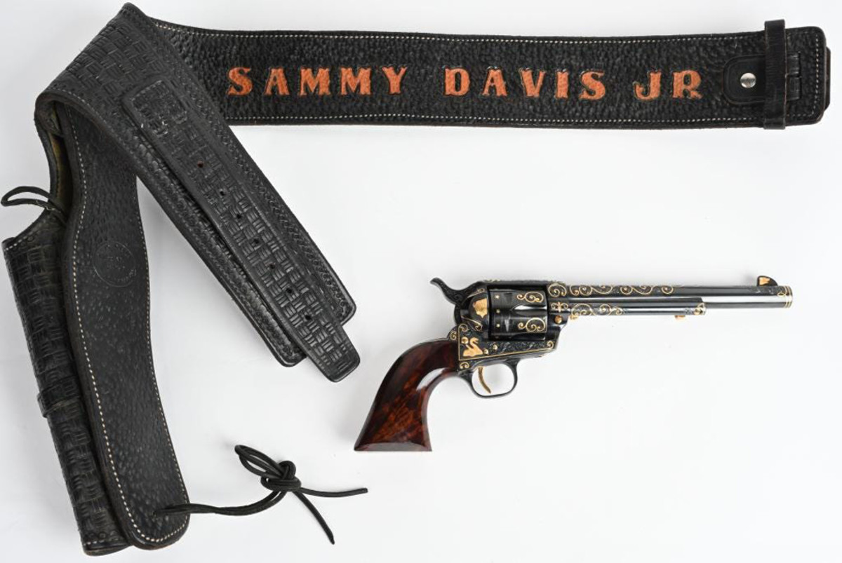 Sammy Davis Jr’s .357 Magnum, 1965, with holster and belt bearing the entertainer’s name. Master engraver Joseph Condon of Las Vegas expertly engraved and added gold inlays of Buffalo Head nickel, coyote, mountain lion, rattlesnake and more. Sold within estimate for $16,800.