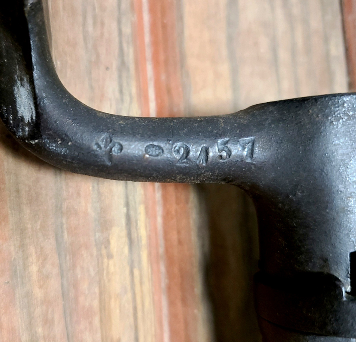 A fleur-de-lis arsenal stamp is found on the shank of the socket-style bayonet.