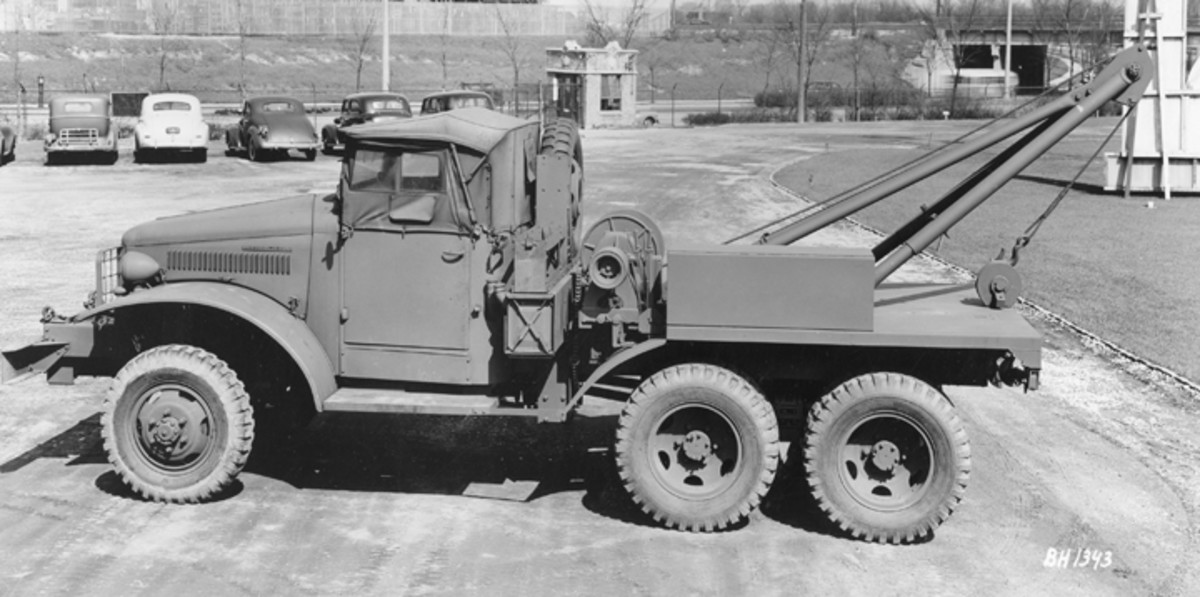 One of the least documented uses of the short wheelbase International chassis was the wrecker variant shown here. These vehicles had a standard front mounted self-recovery winch, and a considerably more powerful gear driven winch behind the cab.