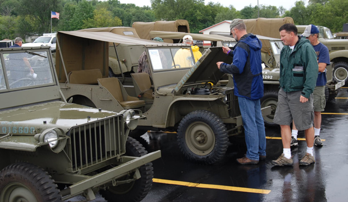 Potential buyer inspecting Jeep at the Chet Krause auction, 2010.