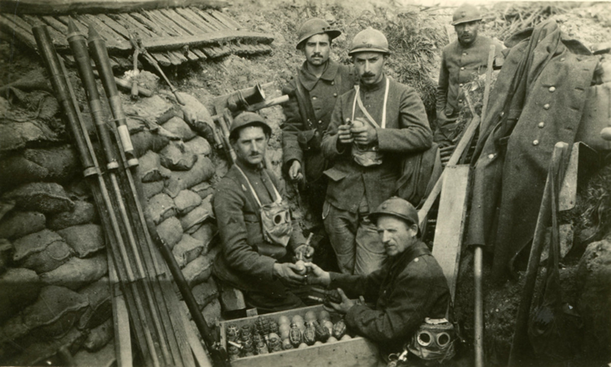 Trench warfare during WWI forced new combat techniques -- including hand-thrown grenades. This photo  shows French soldiers, ca. 1916, preparing a case of grenades during a lull in combat.