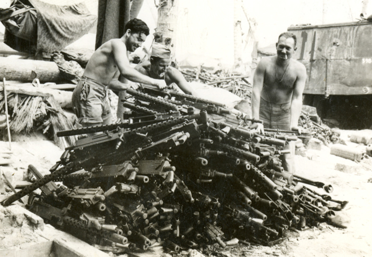 WWII press photo titled, "Burned out guns from battling Japanese at Tarwawa