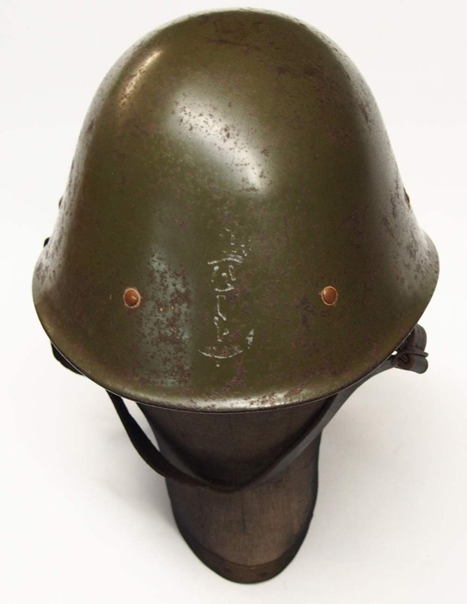 Made in the United States, this Milsco helmet has the stencil of the Royal Netherlands Navy painted on the front.