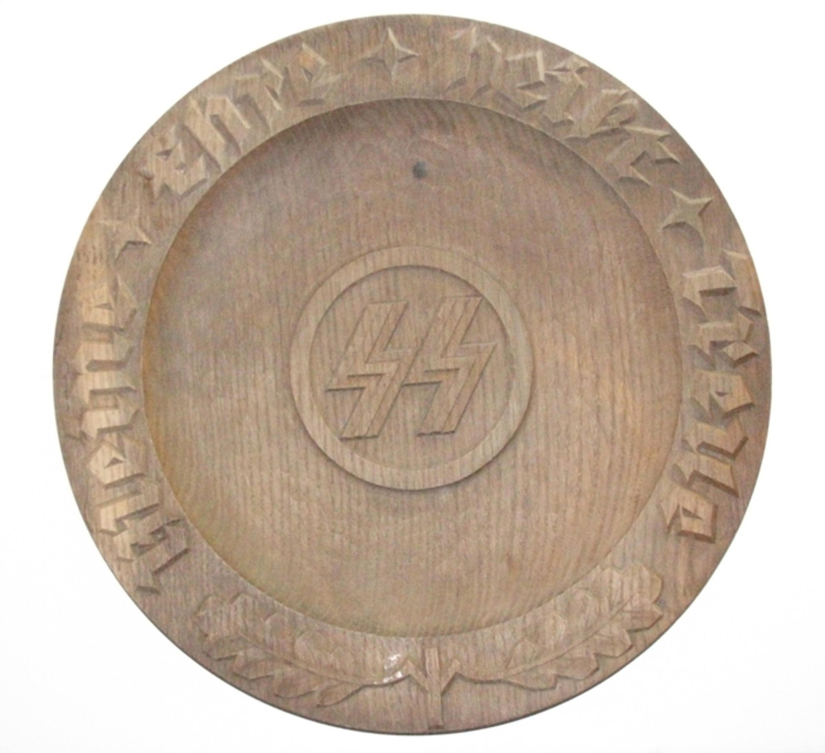 A decorative SS wall plate bears the motto “Meine Ehre Heisst Treue” (My Honor is Loyalty), SS runes and a Life rune with oak leaves along the bottom.
