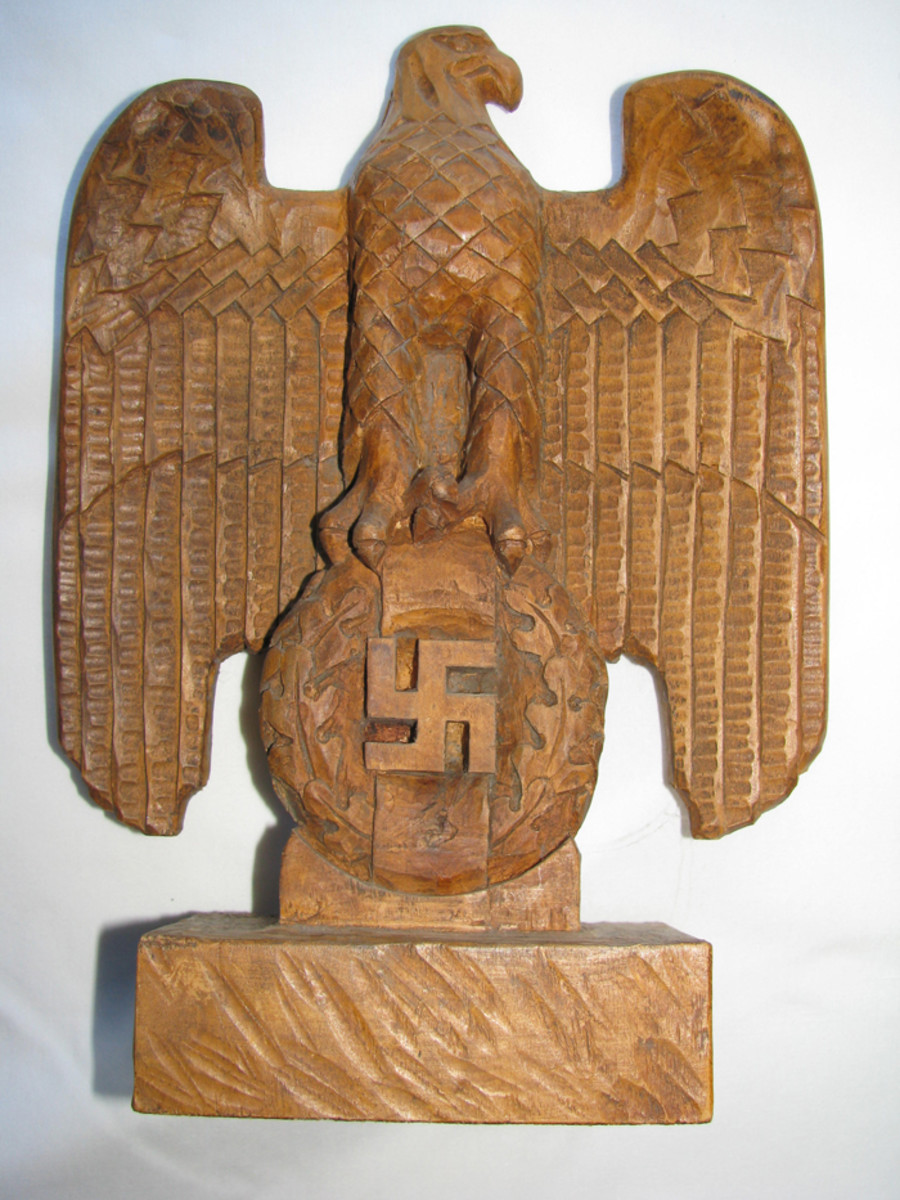 A beautifully carved “Reichs Adler” (national eagle) desk statuette.