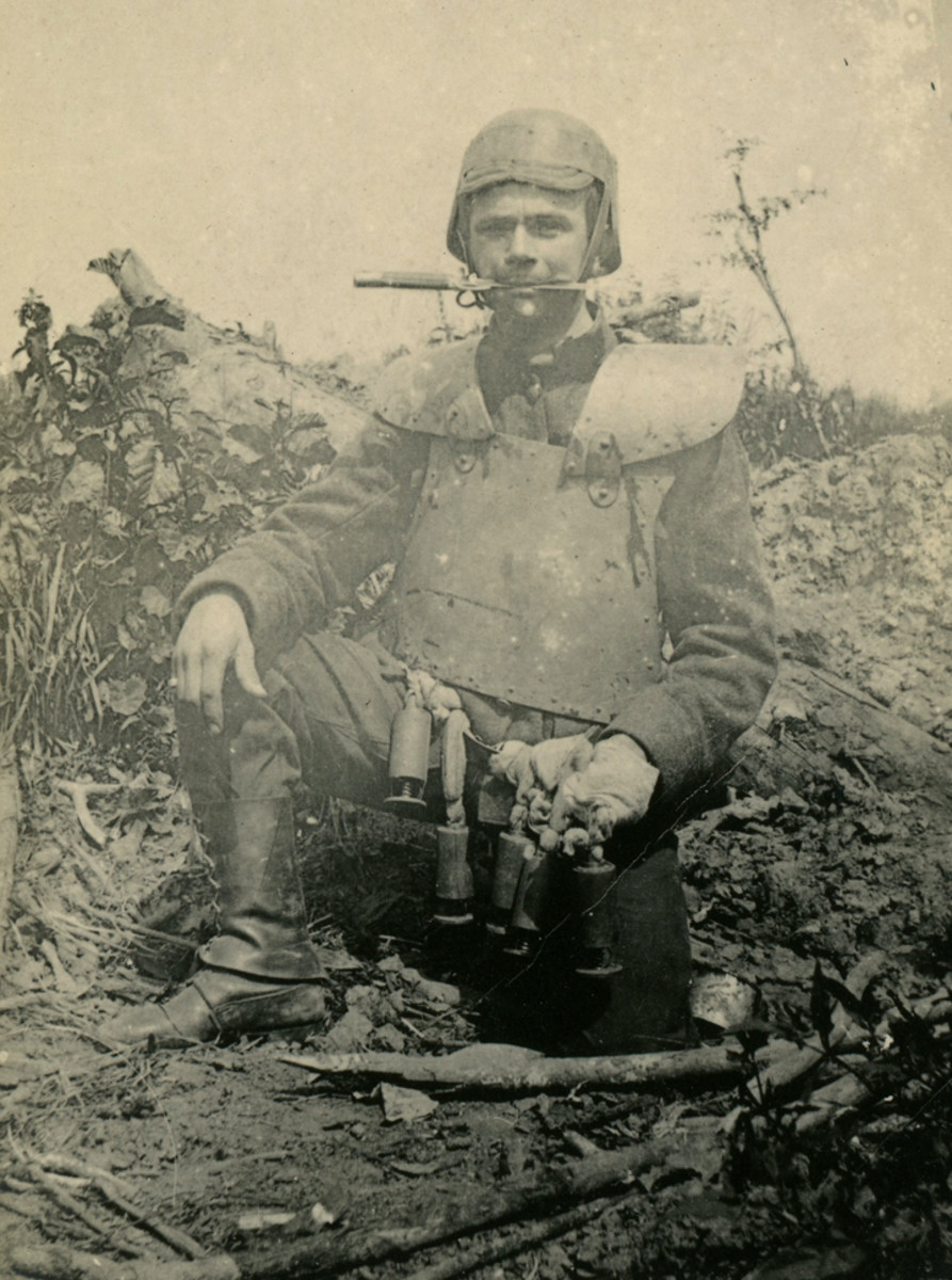 WWI Belgian soldier wearing a Farina helmet and wearing trench armor. He holds a Mauser bayonet in his teeth.