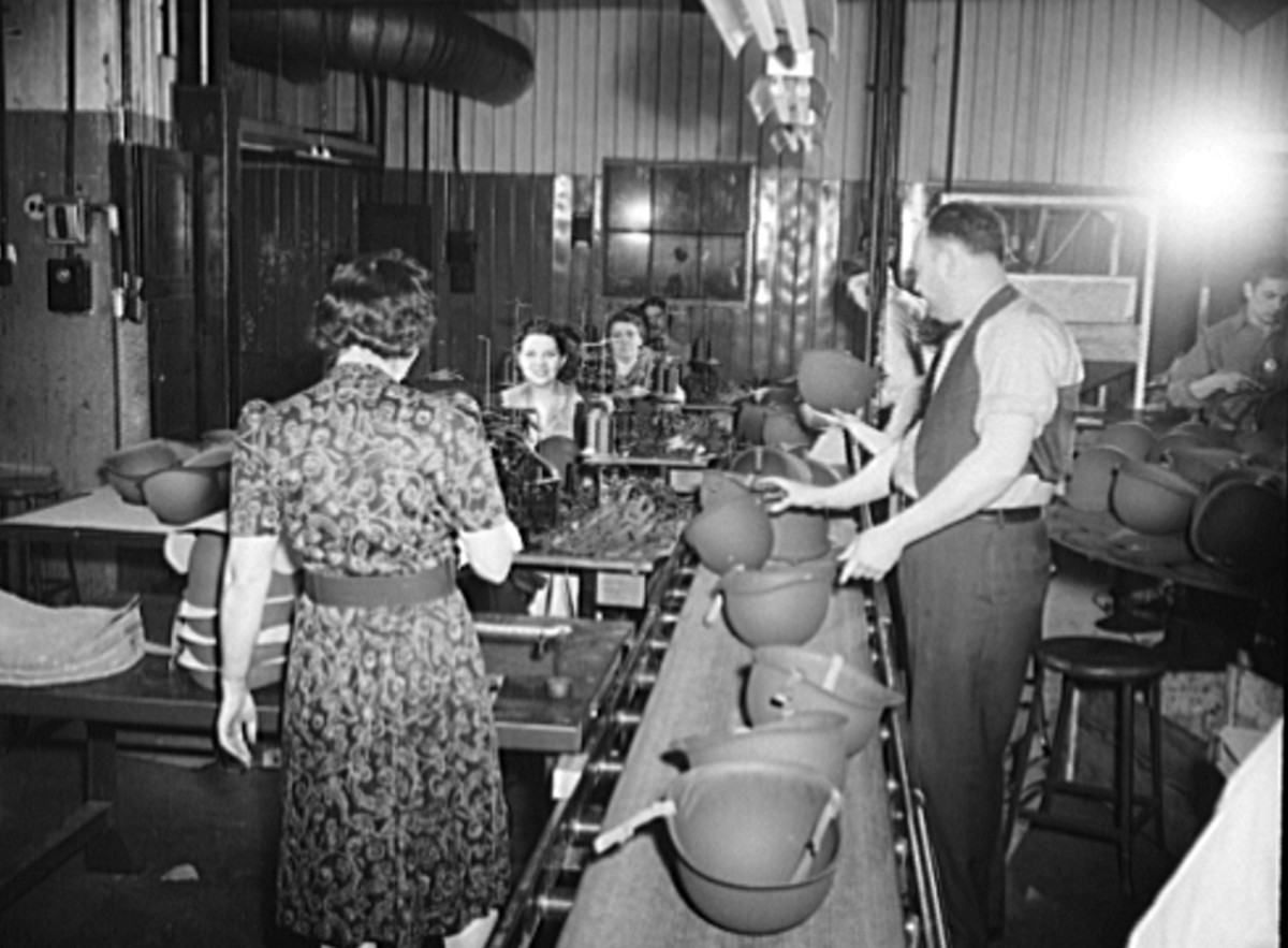 Figure 9. Completed helmets, sans liners, were carefully inspected prior to shipment to army depots.