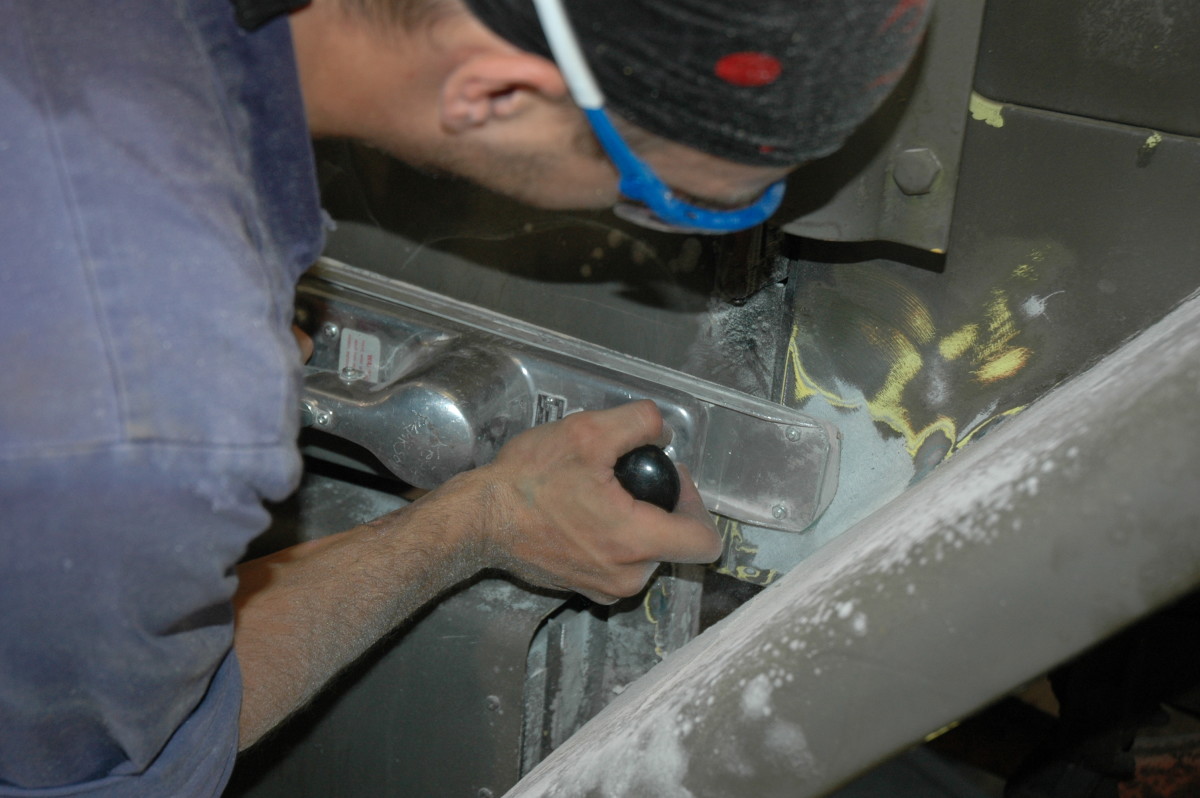 Tip 5: Once the surface has been prepared by sanding, stripping or sandblasting, any flaws in the body should be addressed. These can range from holes added by civilian owners or rust caused bymother nature. Depending on the damage severity, repairs can be affected by installing new panels, welding or using body filler.
