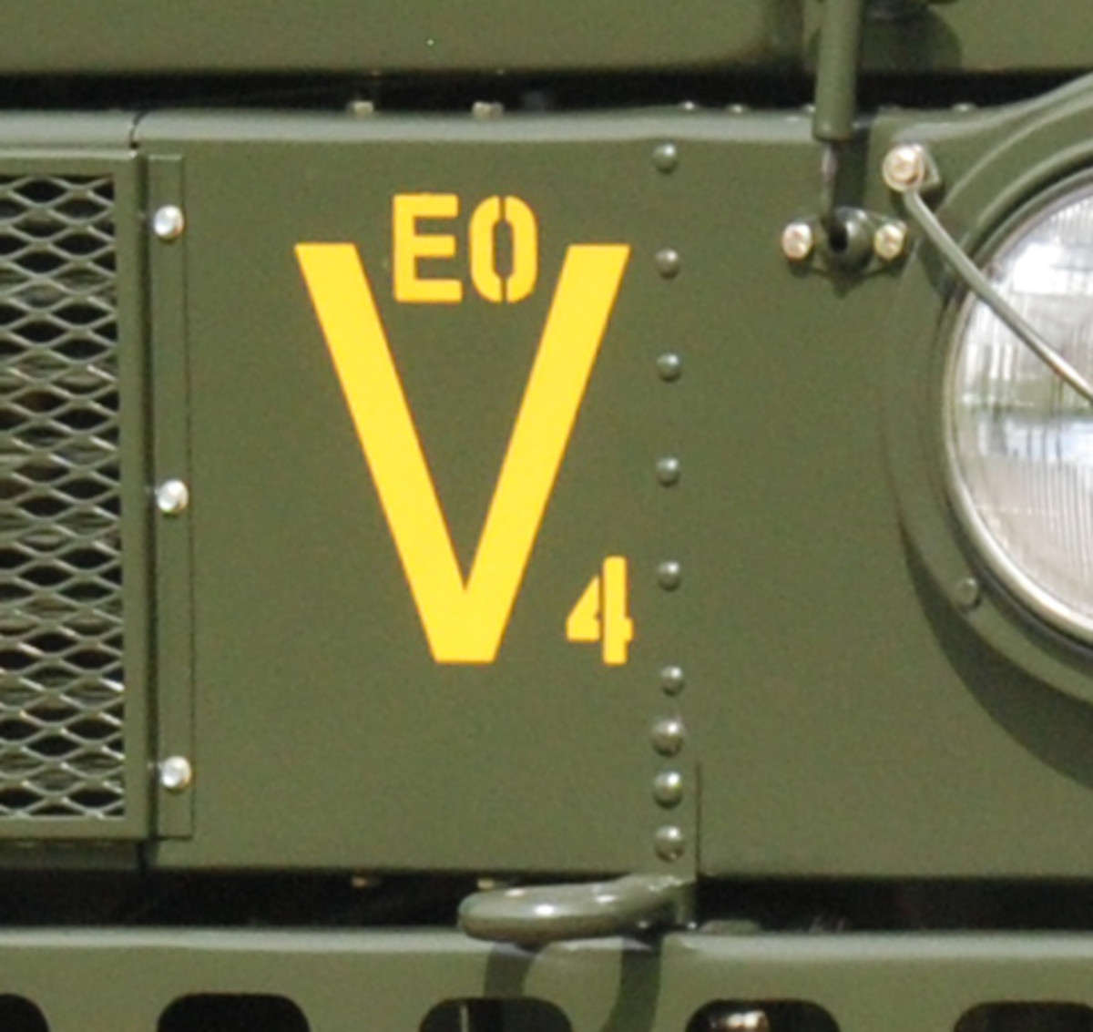 During the restoration, Paul uncovered this set of markings on the front of the truck. He hasn’t been able to to confirm its meaning. Does anyone know what the “EO” inside a “V/4” indicates?
